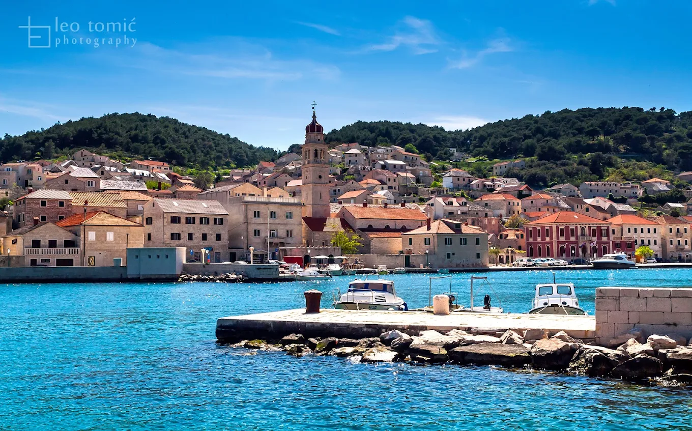 Relaxing on deck during a private full-day sailing charter from Omiš